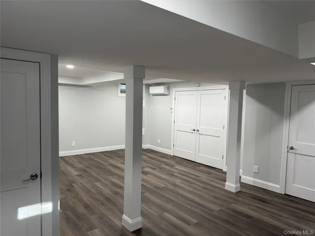 a view of backyard of house with green space