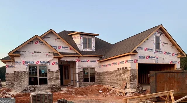 a front view of a building with retail shops