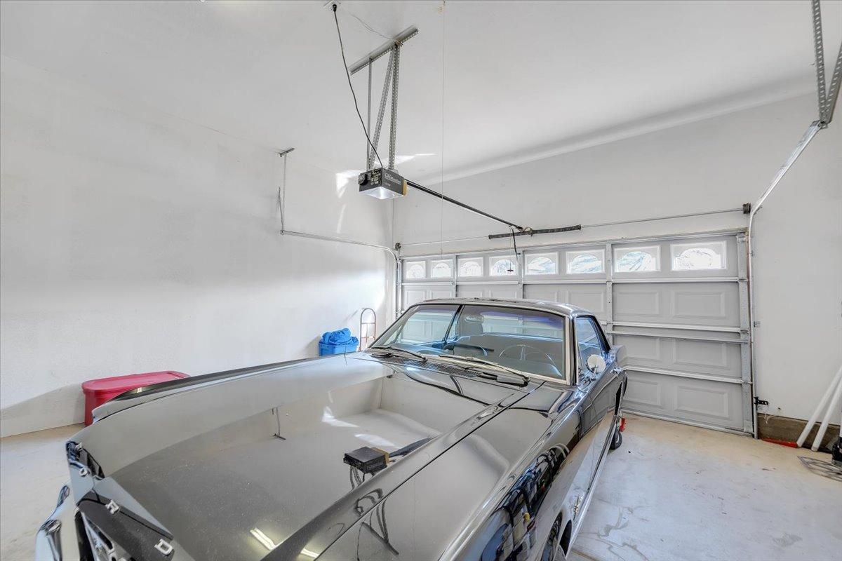 6250 Bluff View Road Copperopolis, CA 95228 - Photo 47 of 84 Spacious 3-car garage with 2-car side and 3rd bay separated by a wall.