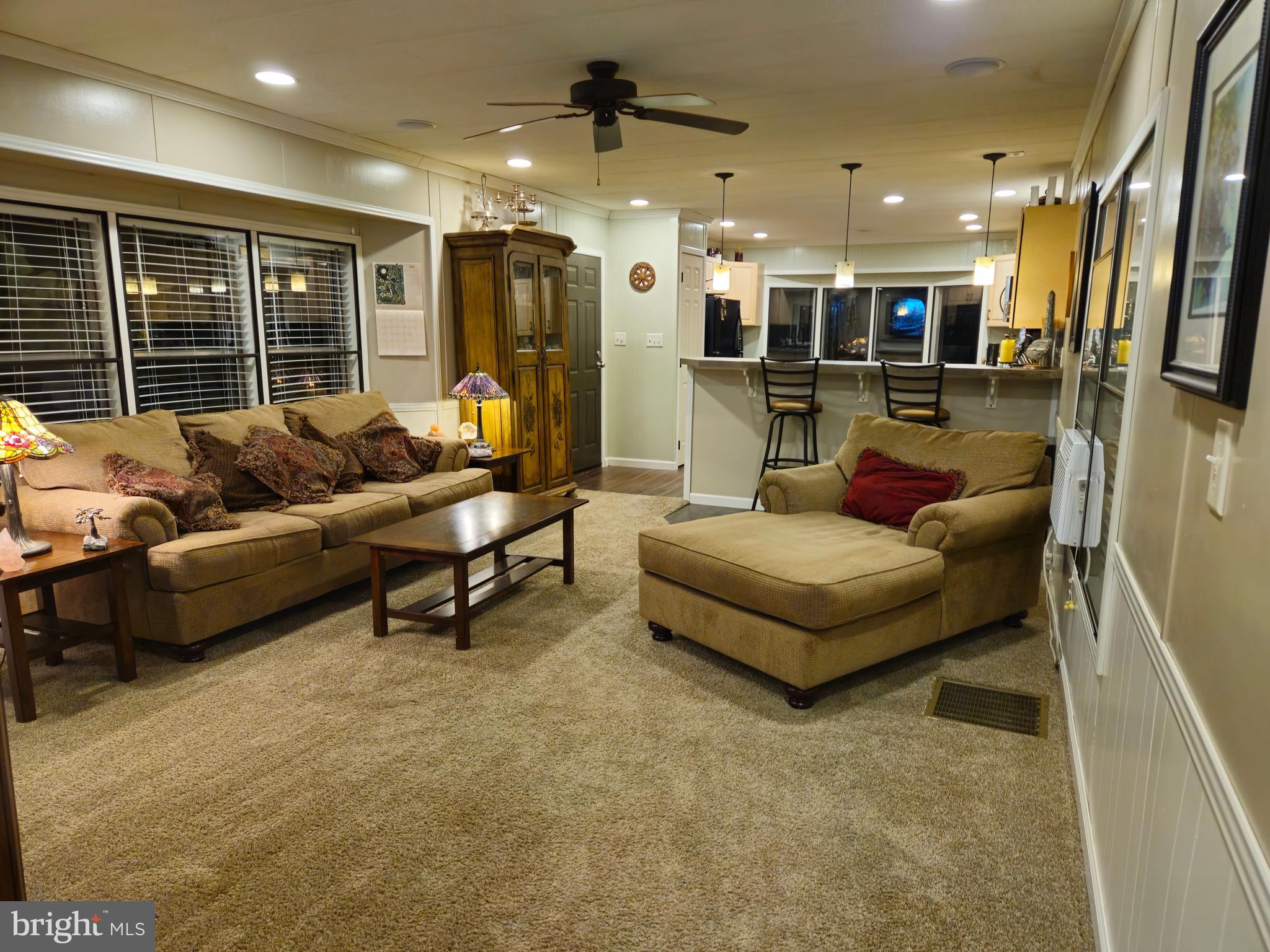 1008 Marticville Road Pequea, PA 17565 - Photo 1 of 27 a living room with furniture and a large window