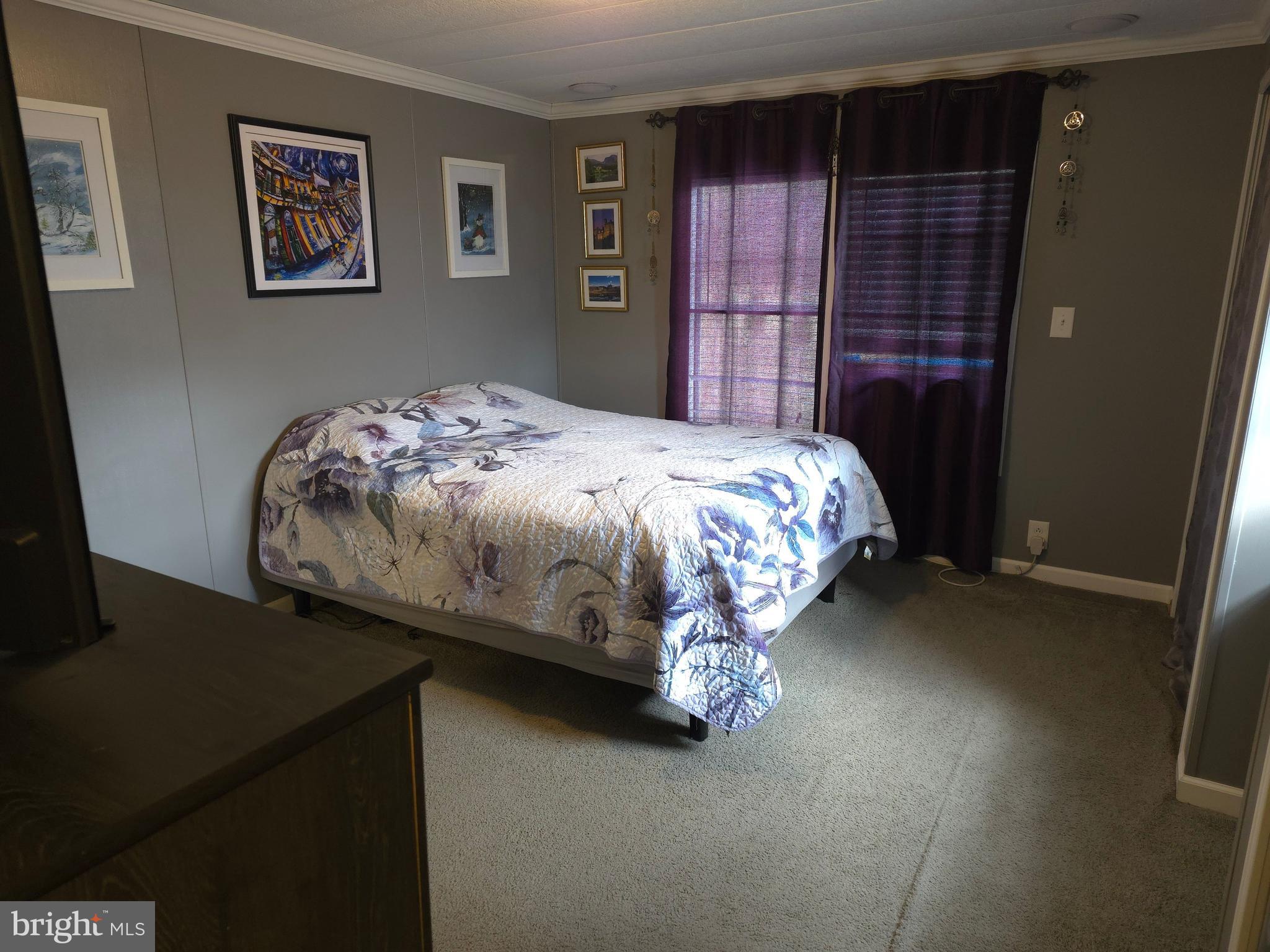 1008 Marticville Road Pequea, PA 17565 - Photo 15 of 27 a bedroom with a bed and a dresser