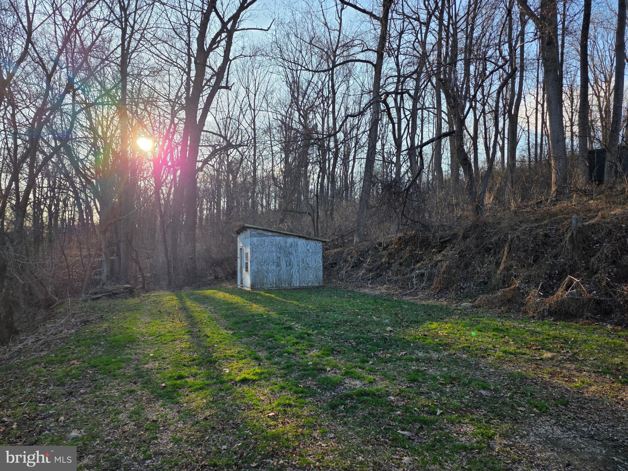 1008 Marticville Road Pequea, PA 17565 - Photo 24 of 27 a backyard of a house with lots of green space