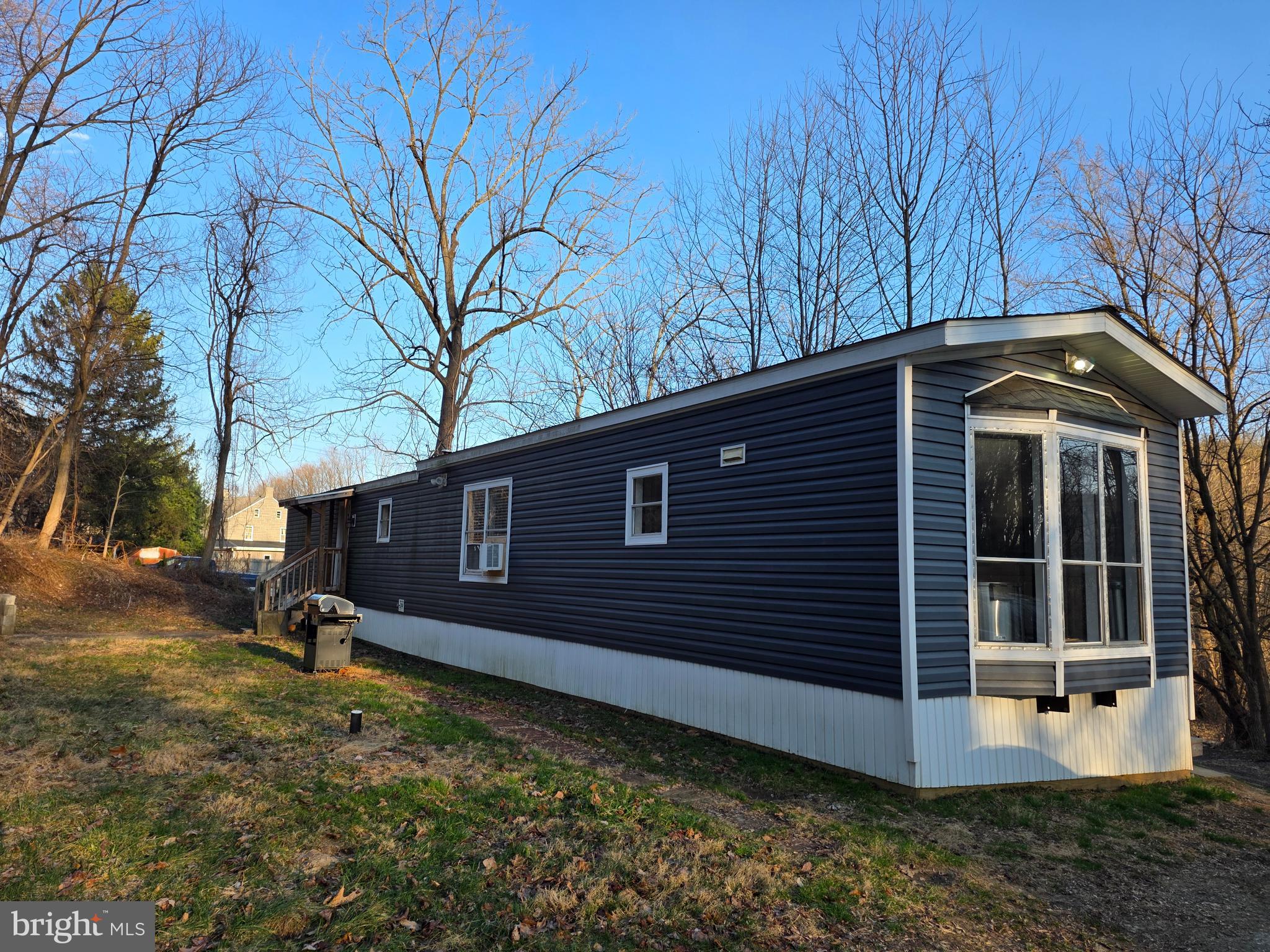 1008 Marticville Road Pequea, PA 17565 - Photo 25 of 27 a front view of a house with garden
