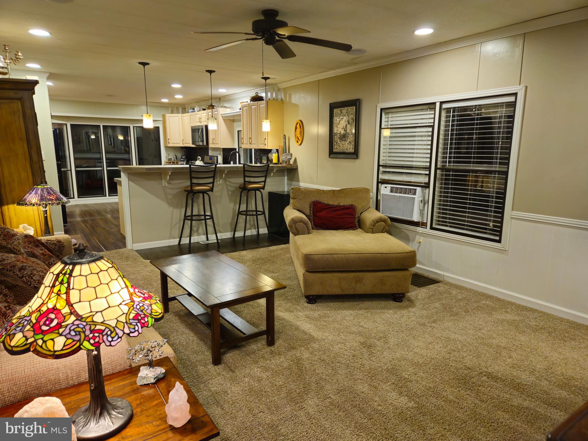 1008 Marticville Road Pequea, PA 17565 - Photo 5 of 27 a living room with furniture and a flat screen tv