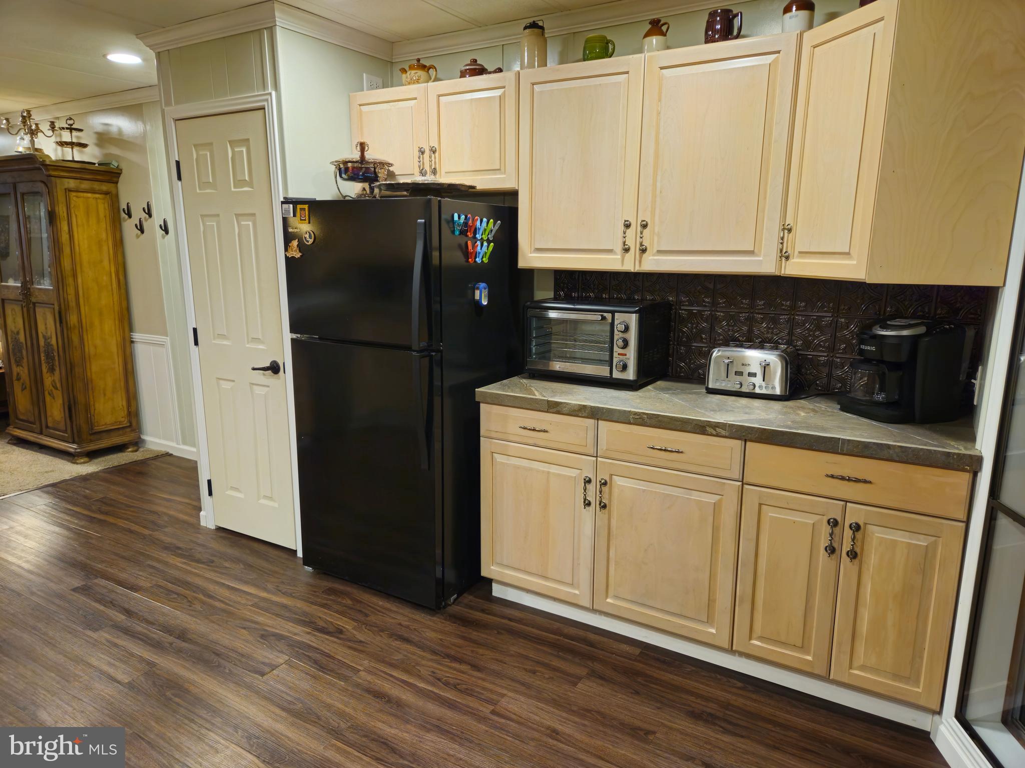 1008 Marticville Road Pequea, PA 17565 - Photo 10 of 27 a kitchen with stainless steel appliances granite countertop a refrigerator a microwave and cabinets
