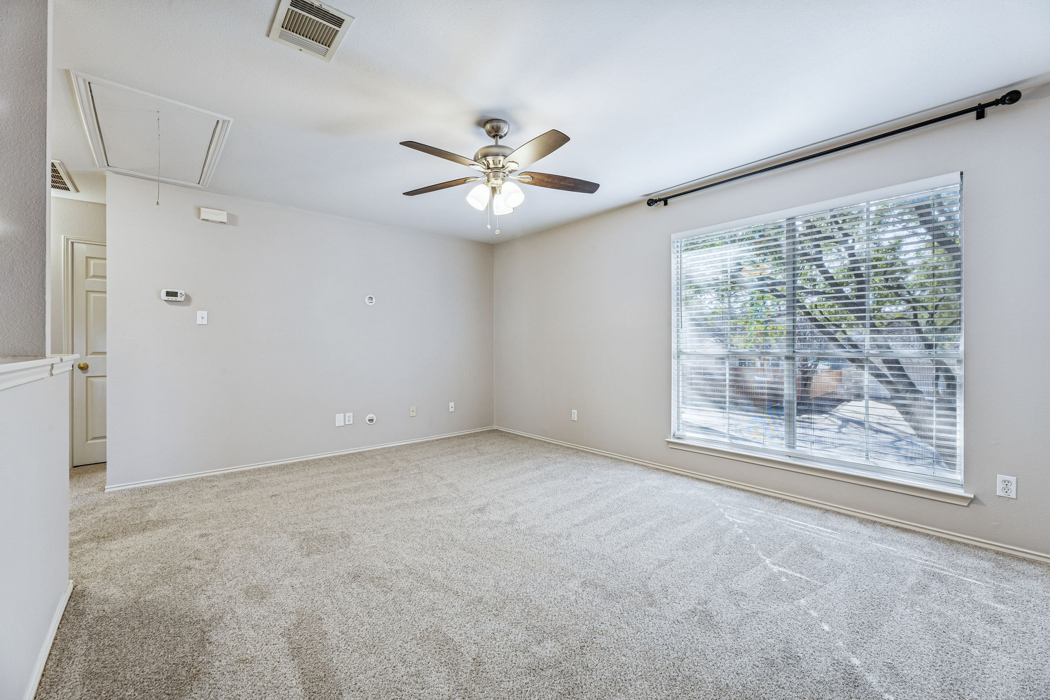 1608 Melibee Trail Austin, TX 78748 - Photo 17 of 29 Unfurnished room featuring light colored carpet and ceiling fan
