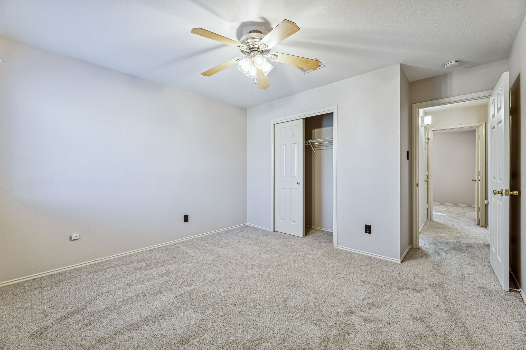 1608 Melibee Trail Austin, TX 78748 - Photo 23 of 29 Unfurnished bedroom with light colored carpet, ceiling fan, and a closet