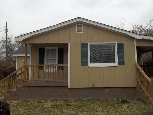 305 East 18th Street Rome, GA 30161 - Photo 1 of 1 a front view of a house with balcony
