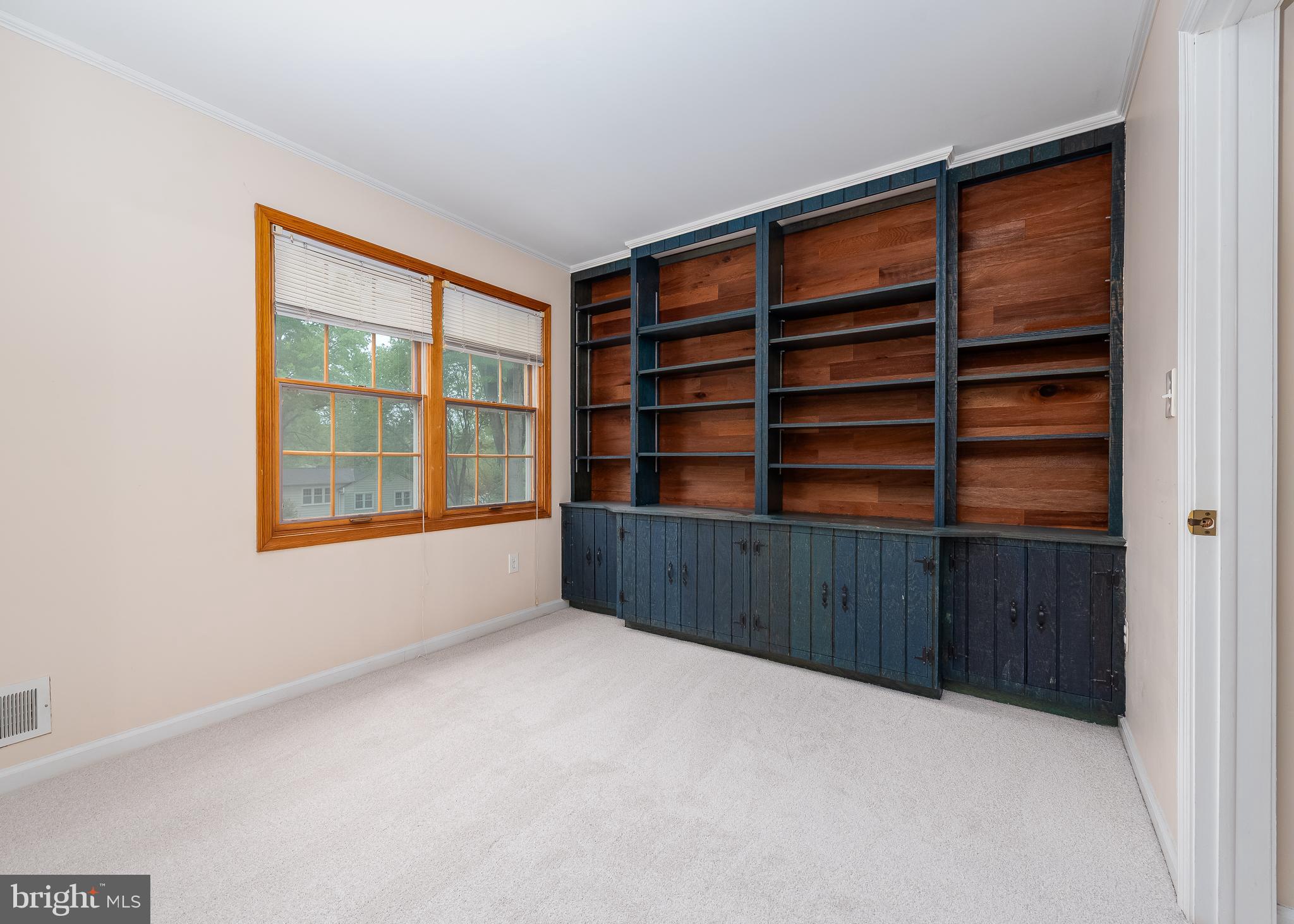 4945 West Running Brook Road Columbia, MD 21044 - Photo 25 of 58 Sitting room with built in book shelves of primary