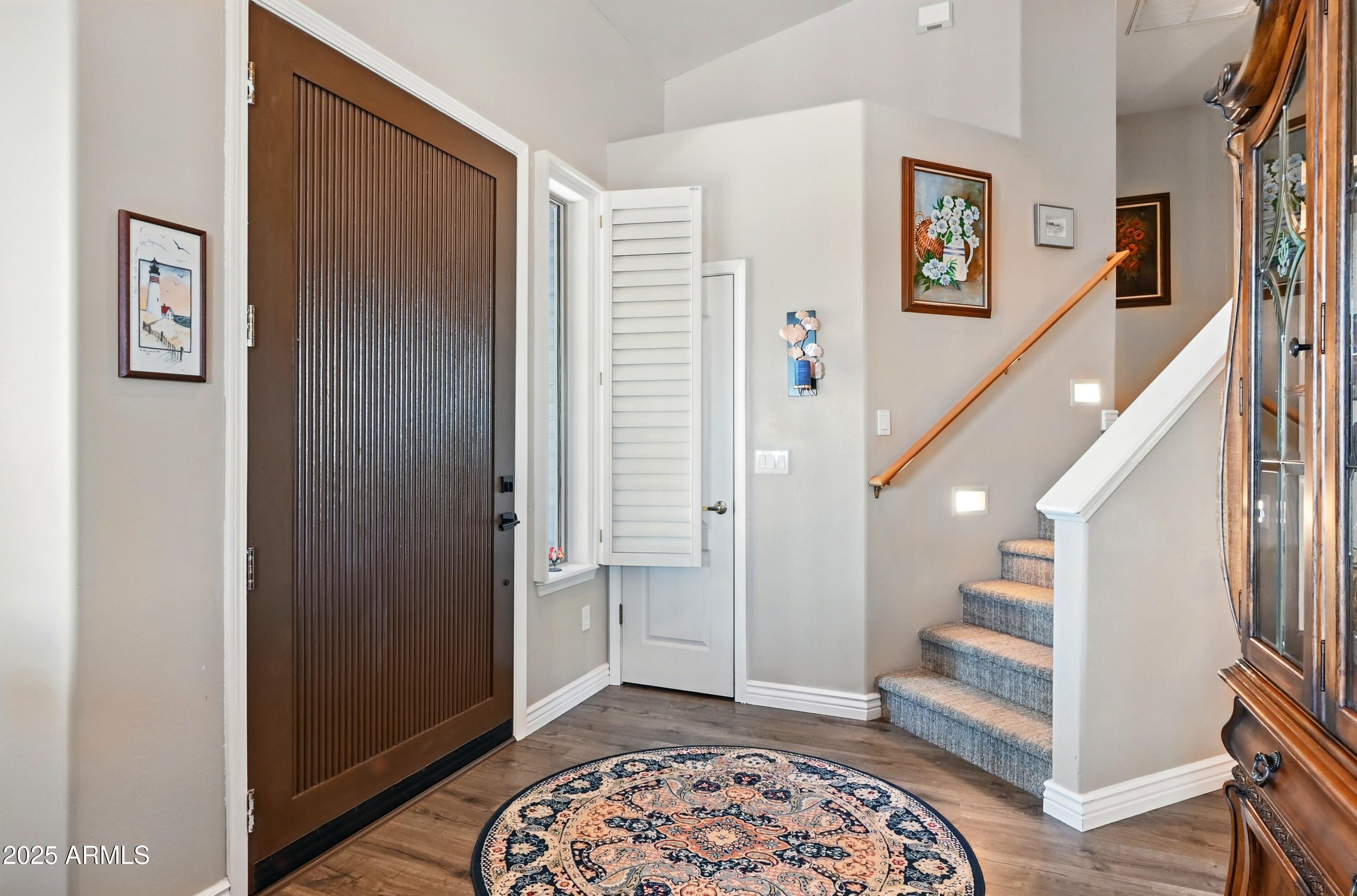 601 East Phoenix Street Payson, AZ 85541 - Photo 17 of 46 a view of an entryway with wooden floor