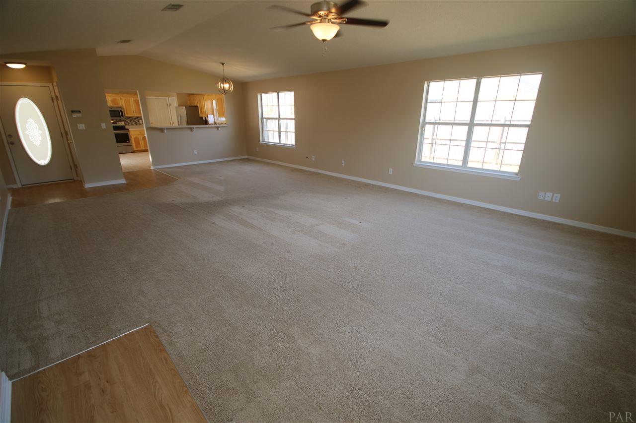6256 Billoree Road Pace, FL 32571 - Photo 21 of 50 leading to patios.So much wall space for furniture