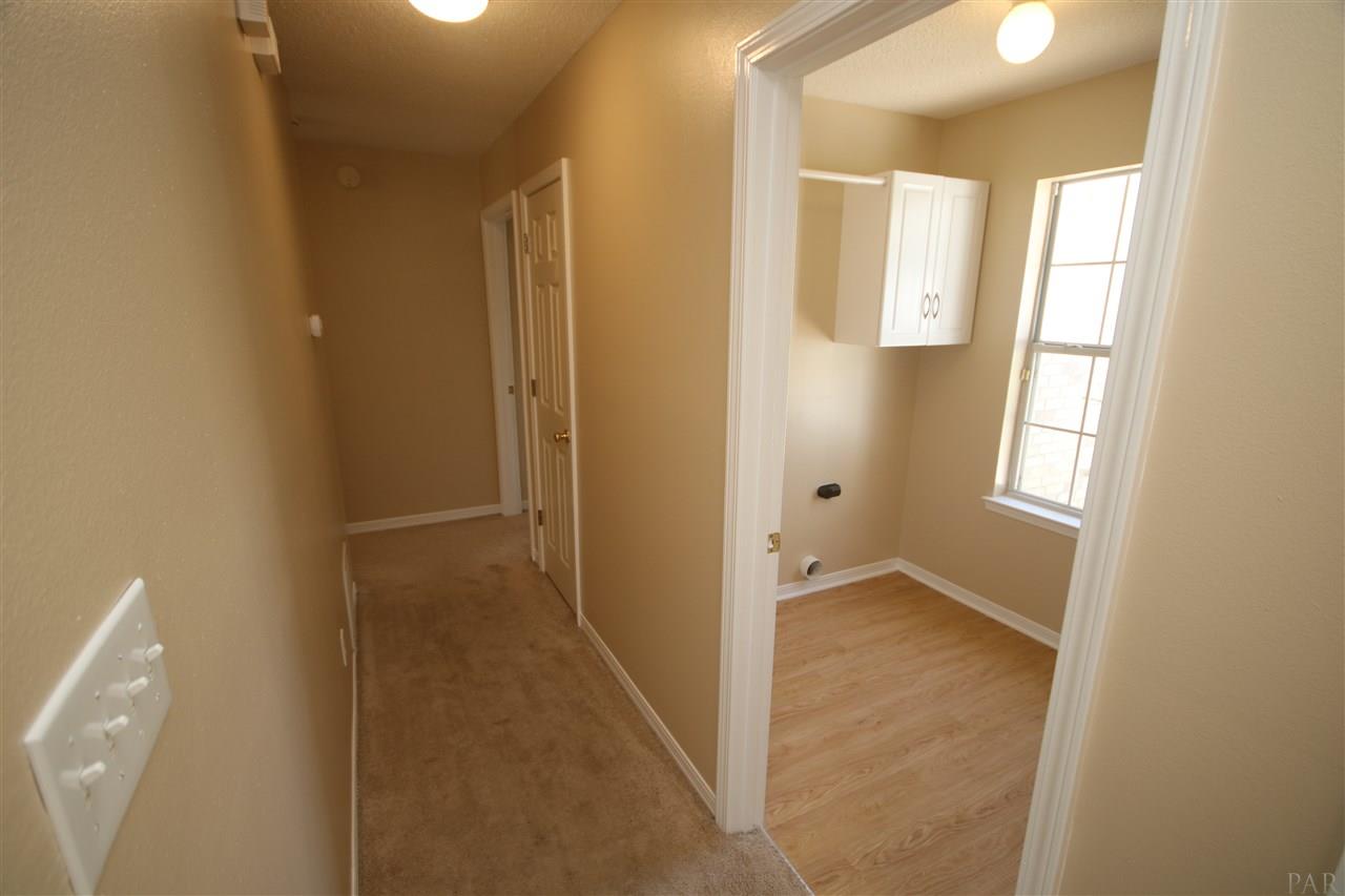 6256 Billoree Road Pace, FL 32571 - Photo 24 of 50 on right. Linen closet is closed door on right.