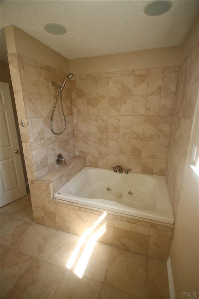 6256 Billoree Road Pace, FL 32571 - Photo 29 of 50 the Jacuzzi Tub/shower. Tile surround.