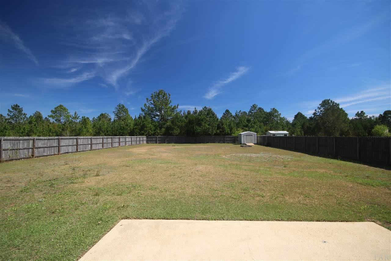 6256 Billoree Road Pace, FL 32571 - Photo 3 of 50 allows room for all your outdoor toys & activities