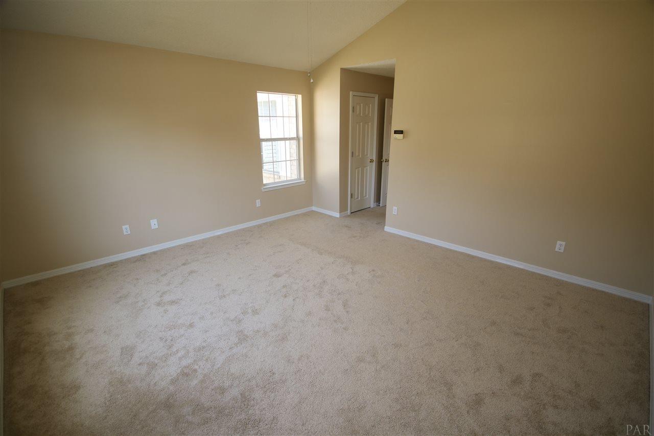 6256 Billoree Road Pace, FL 32571 - Photo 33 of 50 Door in view is storage closet. Very high ceilings