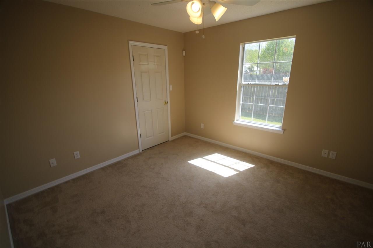 6256 Billoree Road Pace, FL 32571 - Photo 38 of 50 large walk in closet w/ light. Lighted ceiling fan