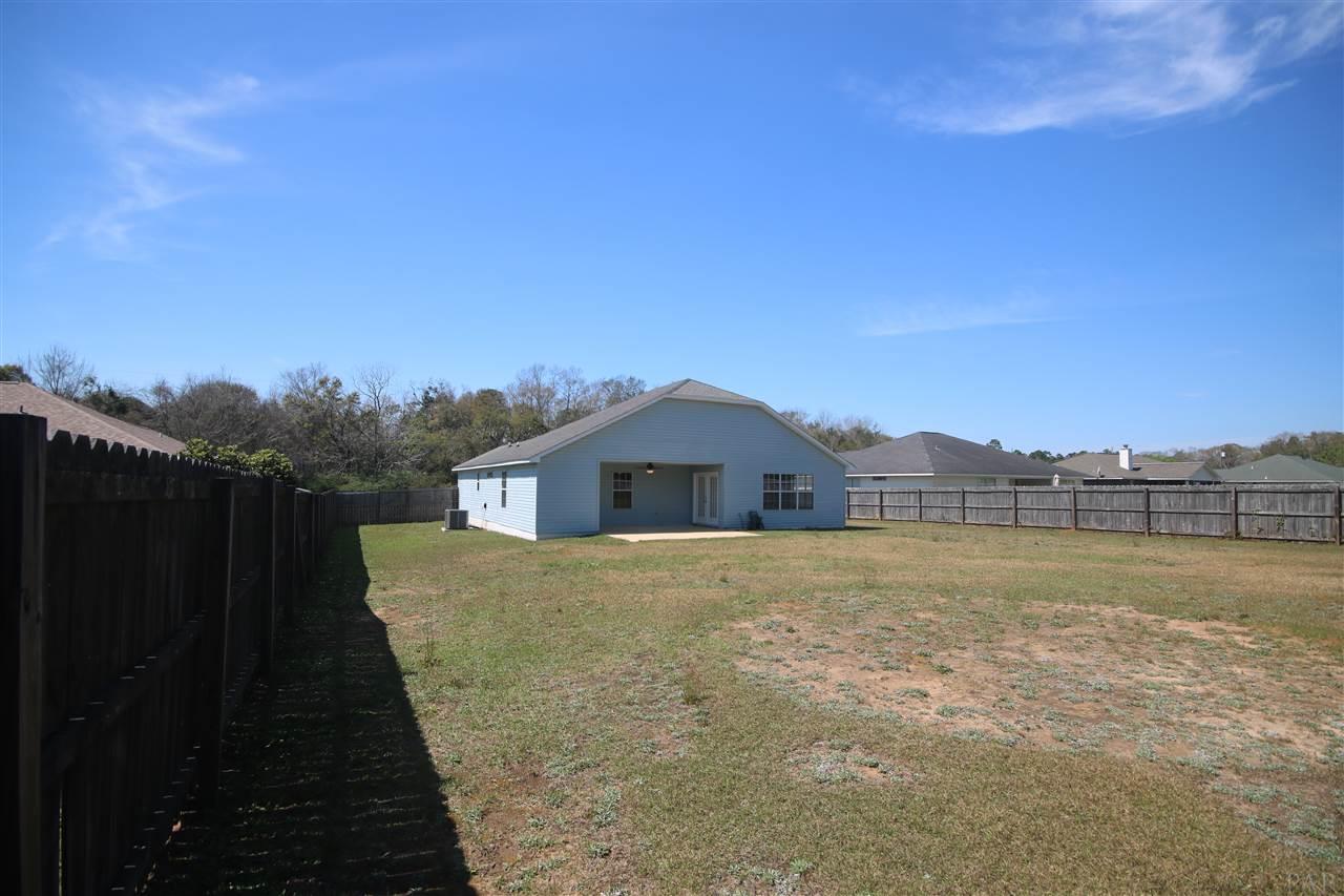 6256 Billoree Road Pace, FL 32571 - Photo 46 of 50 yard. View of Western skies.Single gate to right.