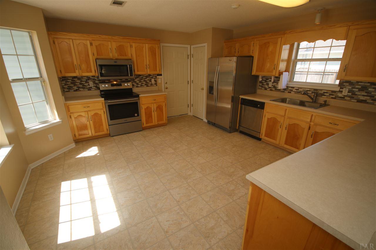 6256 Billoree Road Pace, FL 32571 - Photo 10 of 50 a floating island in this large kitchen.