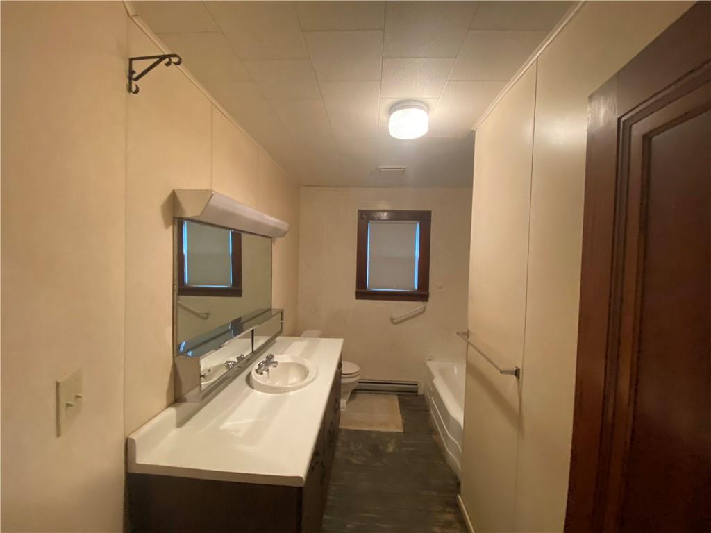 164-185 Cornfield Road Dayton, PA 16222 - Photo 11 of 25 a bathroom with a sink and a mirror