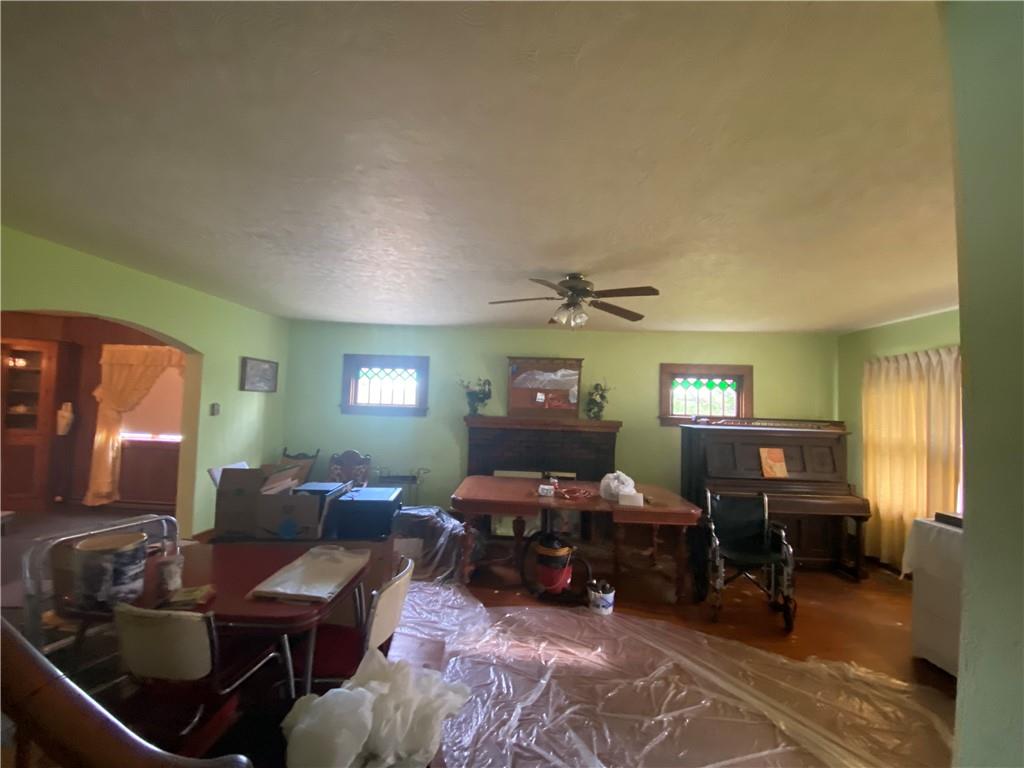 164-185 Cornfield Road Dayton, PA 16222 - Photo 12 of 25 a living room with furniture a large window and bookshelf