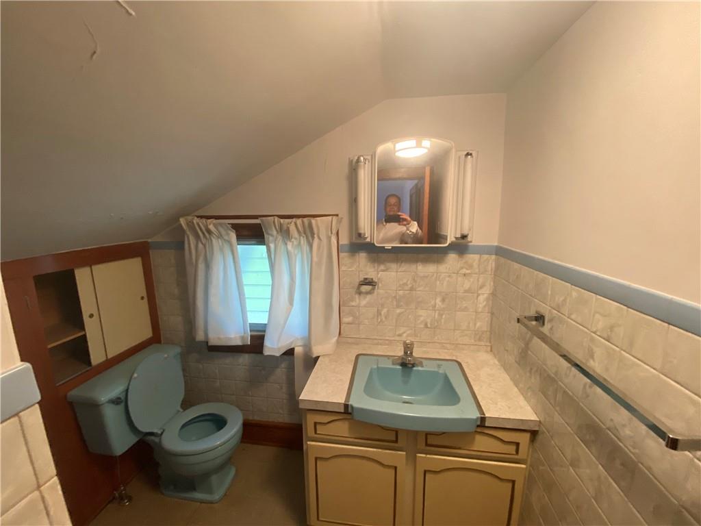 164-185 Cornfield Road Dayton, PA 16222 - Photo 18 of 25 a bathroom with a sink toilet and mirror