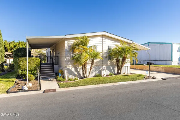 a view of a building with a park