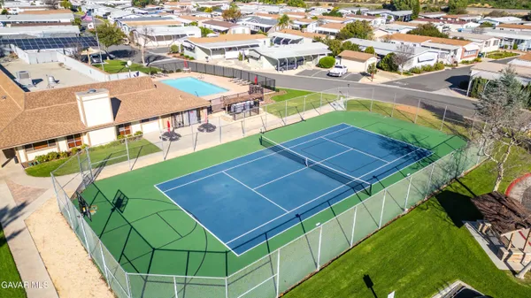 an aerial view of a tennis ground