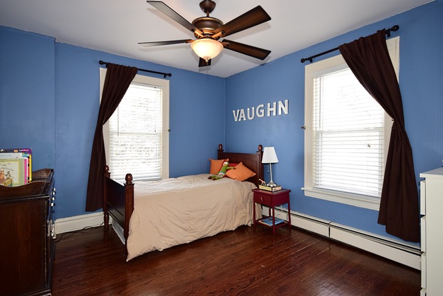 180 Fairbank Road Riverside, IL 60546 - Photo 19 of 25 a bedroom with a bed and a window