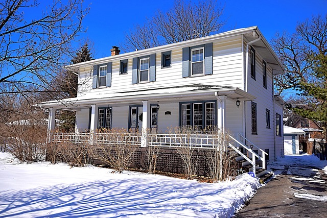180 Fairbank Road Riverside, IL 60546 - Photo 2 of 25 a front view of a house with a yard
