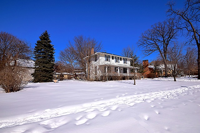 180 Fairbank Road Riverside, IL 60546 - Photo 25 of 25 a front view of a house with a snow yard