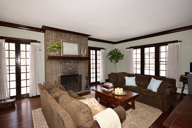 180 Fairbank Road Riverside, IL 60546 - Photo 6 of 25 a living room with furniture and a fireplace