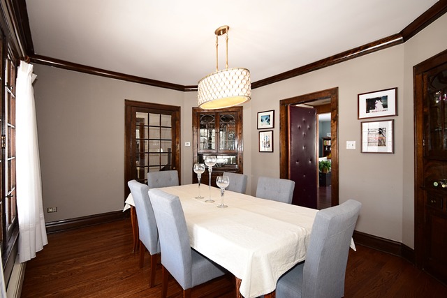 180 Fairbank Road Riverside, IL 60546 - Photo 8 of 25 a view of a dining room with furniture window and wooden floor