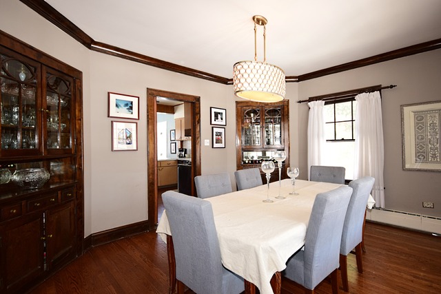 180 Fairbank Road Riverside, IL 60546 - Photo 9 of 25 a view of a dining room with furniture window and wooden floor