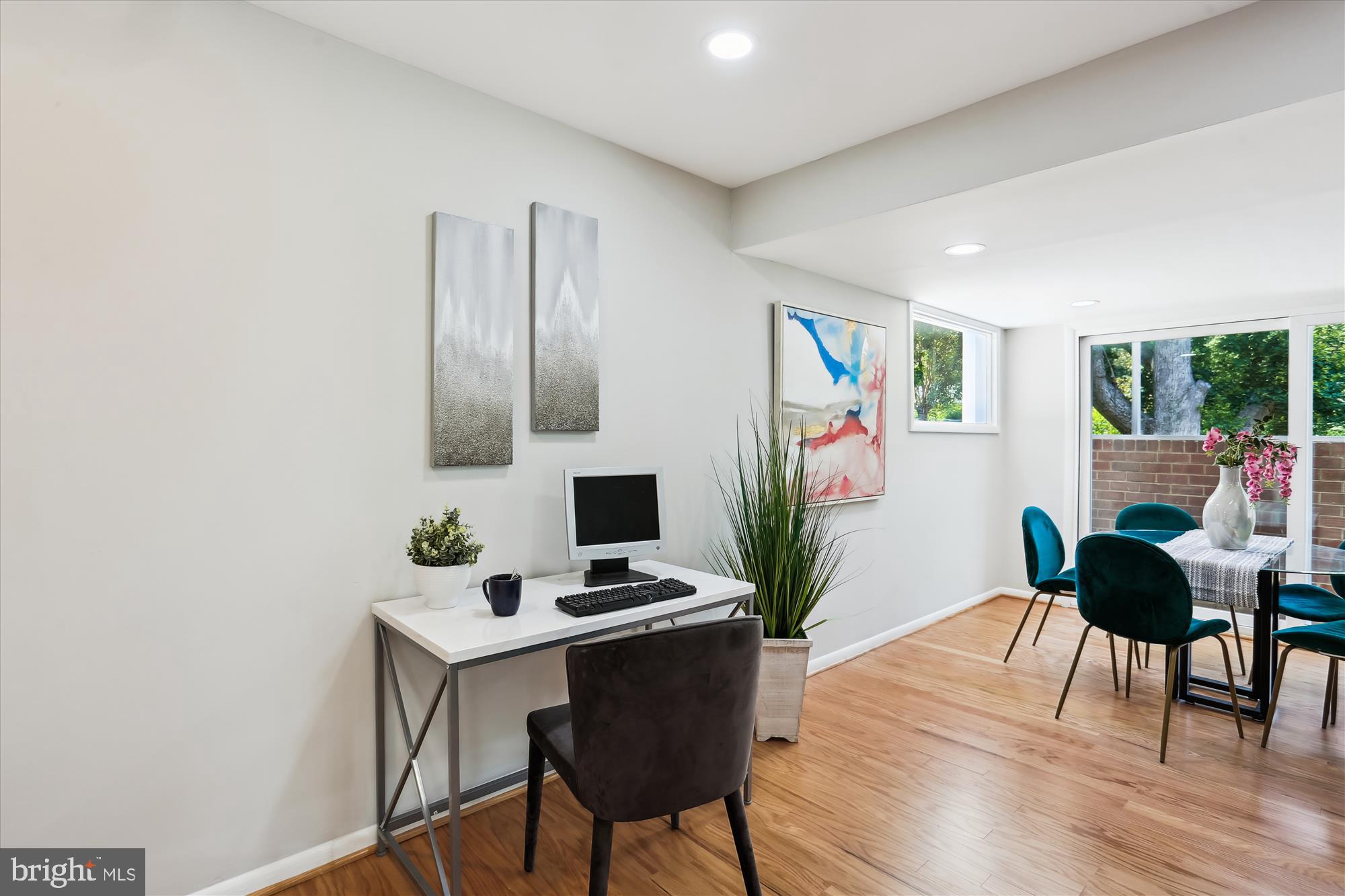 11524 Charlton Drive Silver Spring, MD 20902 - Photo 18 of 64 a workspace with furniture and wooden floor