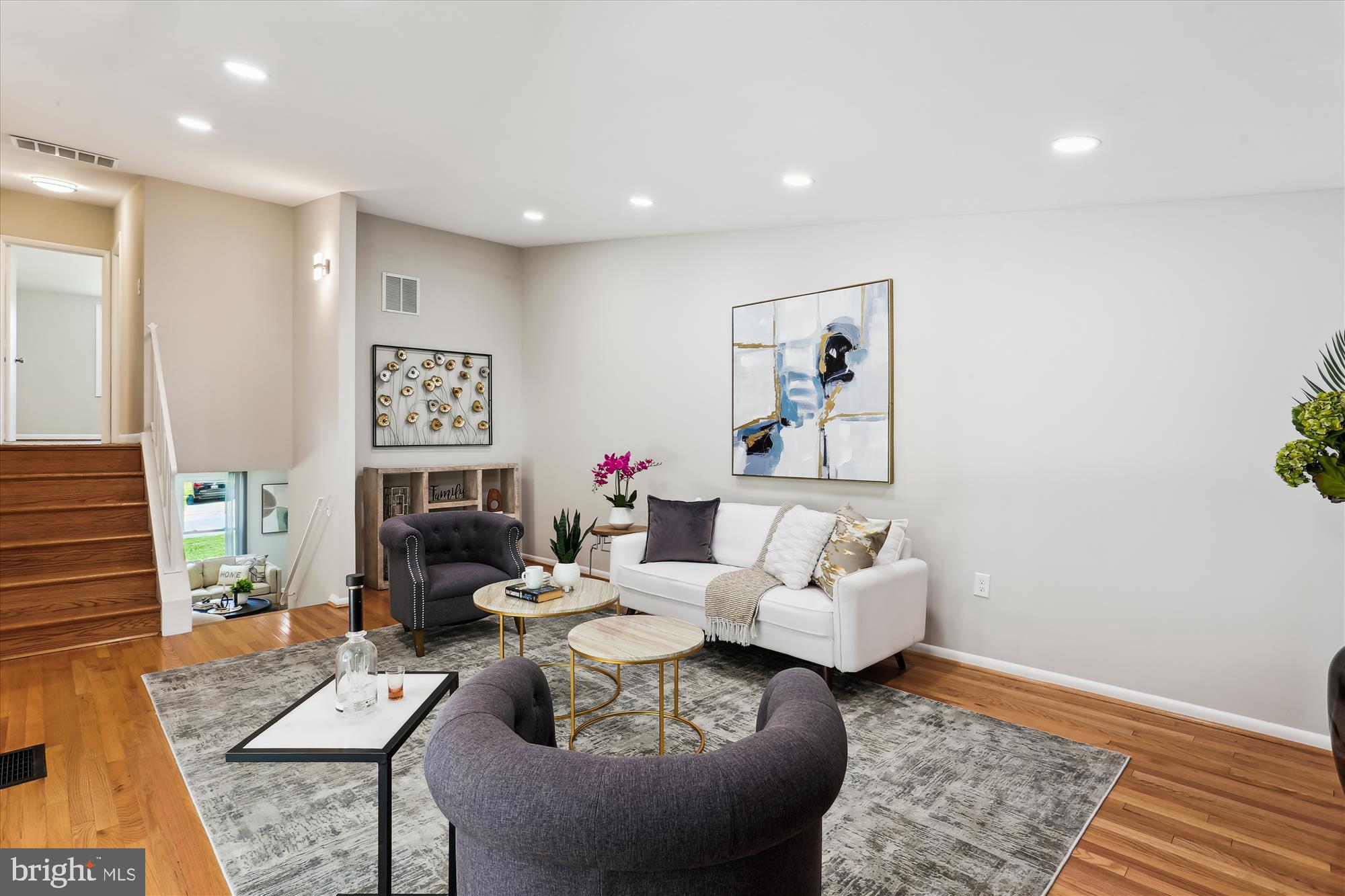 11524 Charlton Drive Silver Spring, MD 20902 - Photo 25 of 64 a living room with furniture and a rug