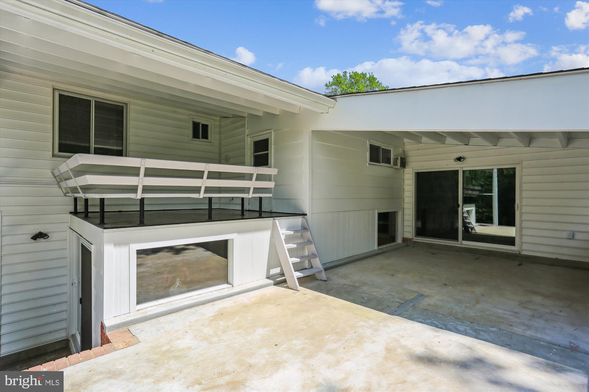 11524 Charlton Drive Silver Spring, MD 20902 - Photo 27 of 64 a view of a house with a door and a window