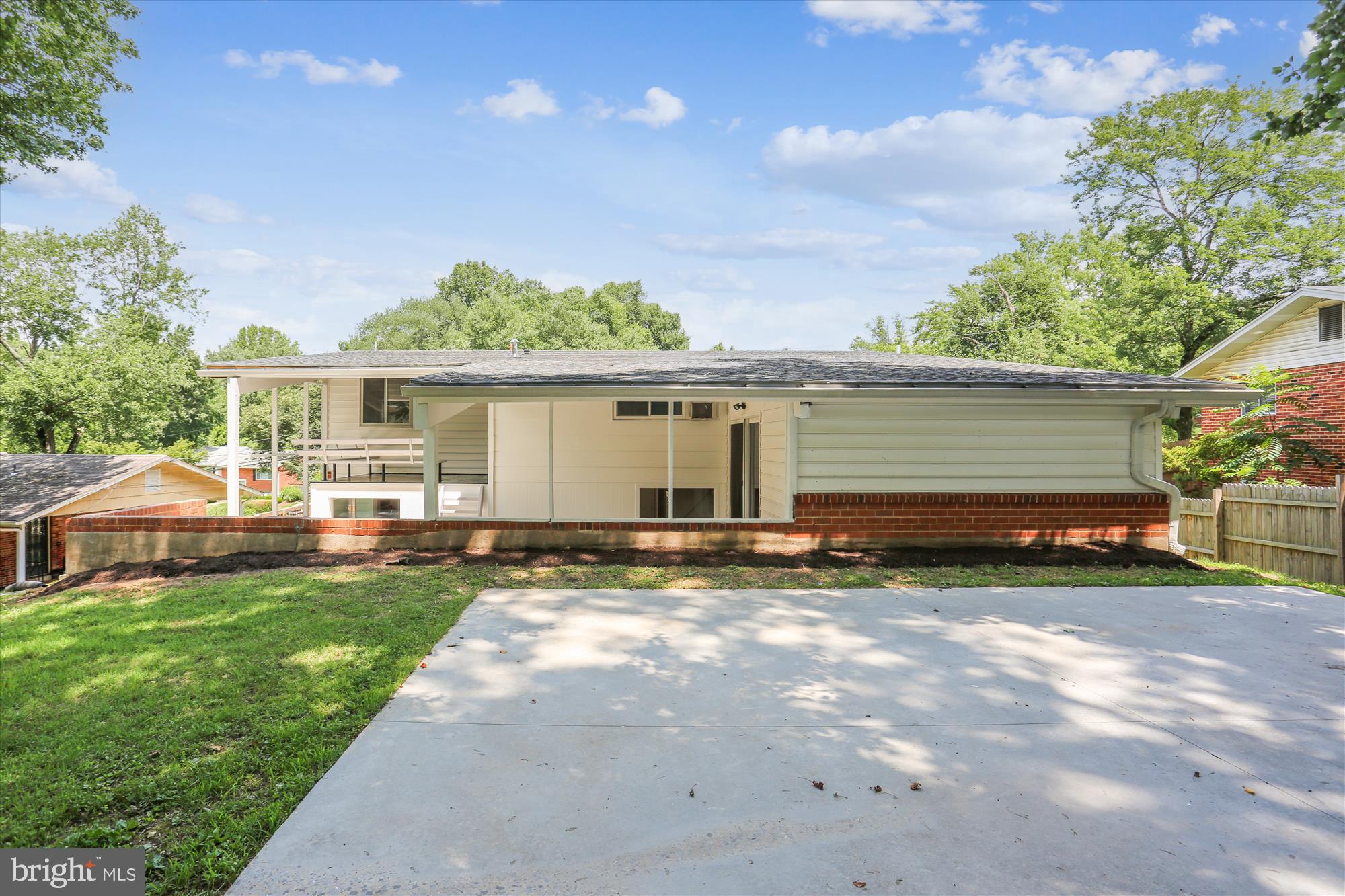 11524 Charlton Drive Silver Spring, MD 20902 - Photo 55 of 64 a view of a house with a yard and sitting area