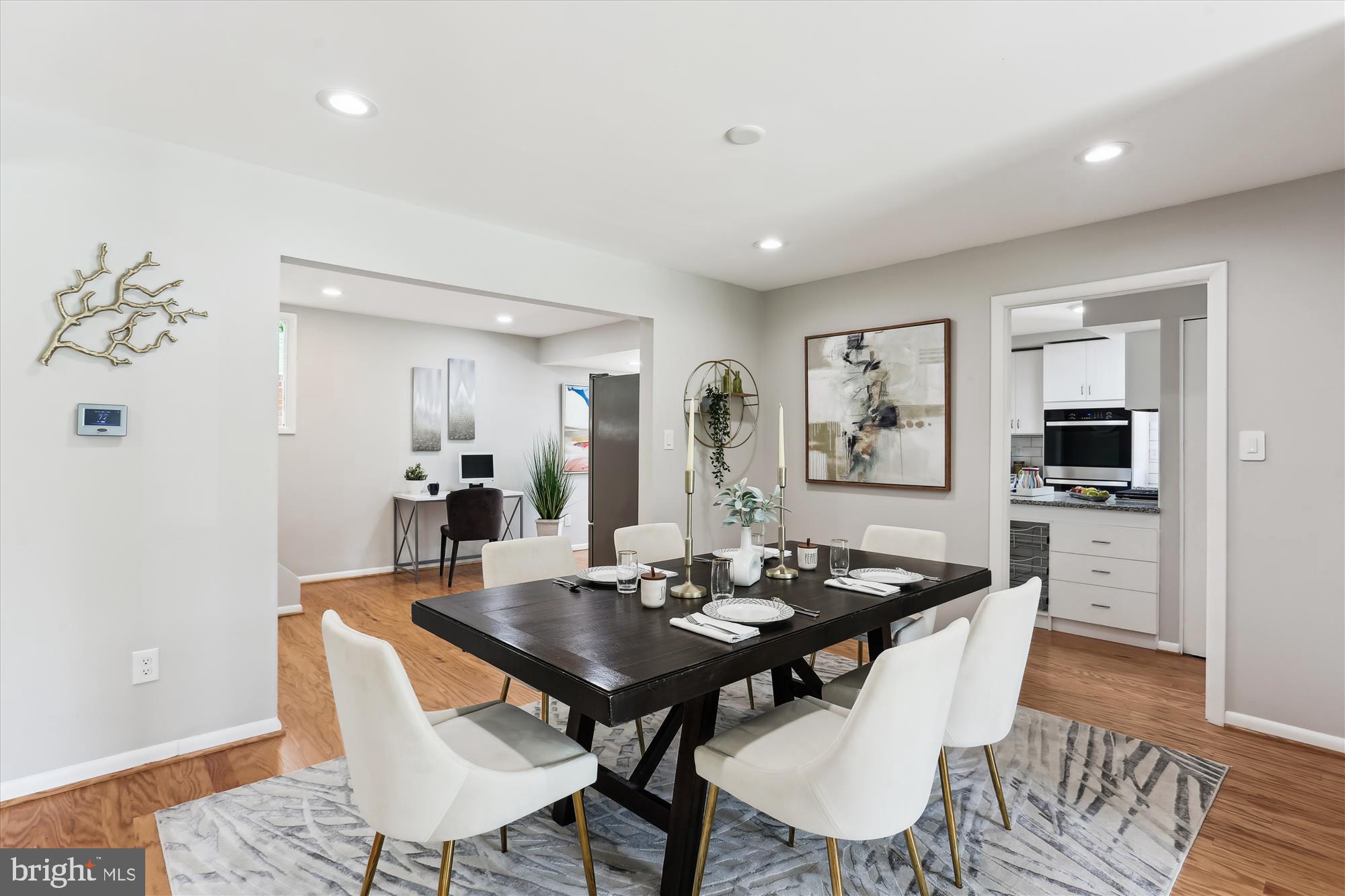 11524 Charlton Drive Silver Spring, MD 20902 - Photo 9 of 64 a view of a dining room with furniture and wooden floor