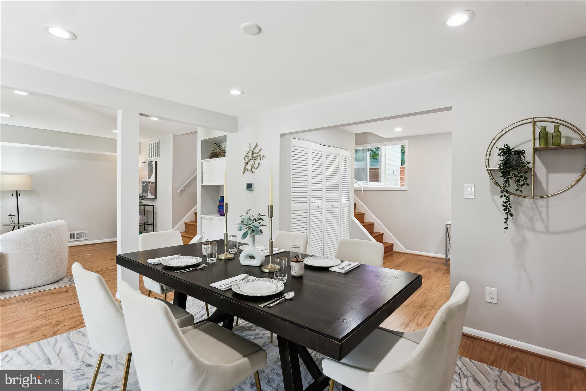 11524 Charlton Drive Silver Spring, MD 20902 - Photo 10 of 64 a view of a dining room with furniture and wooden floor