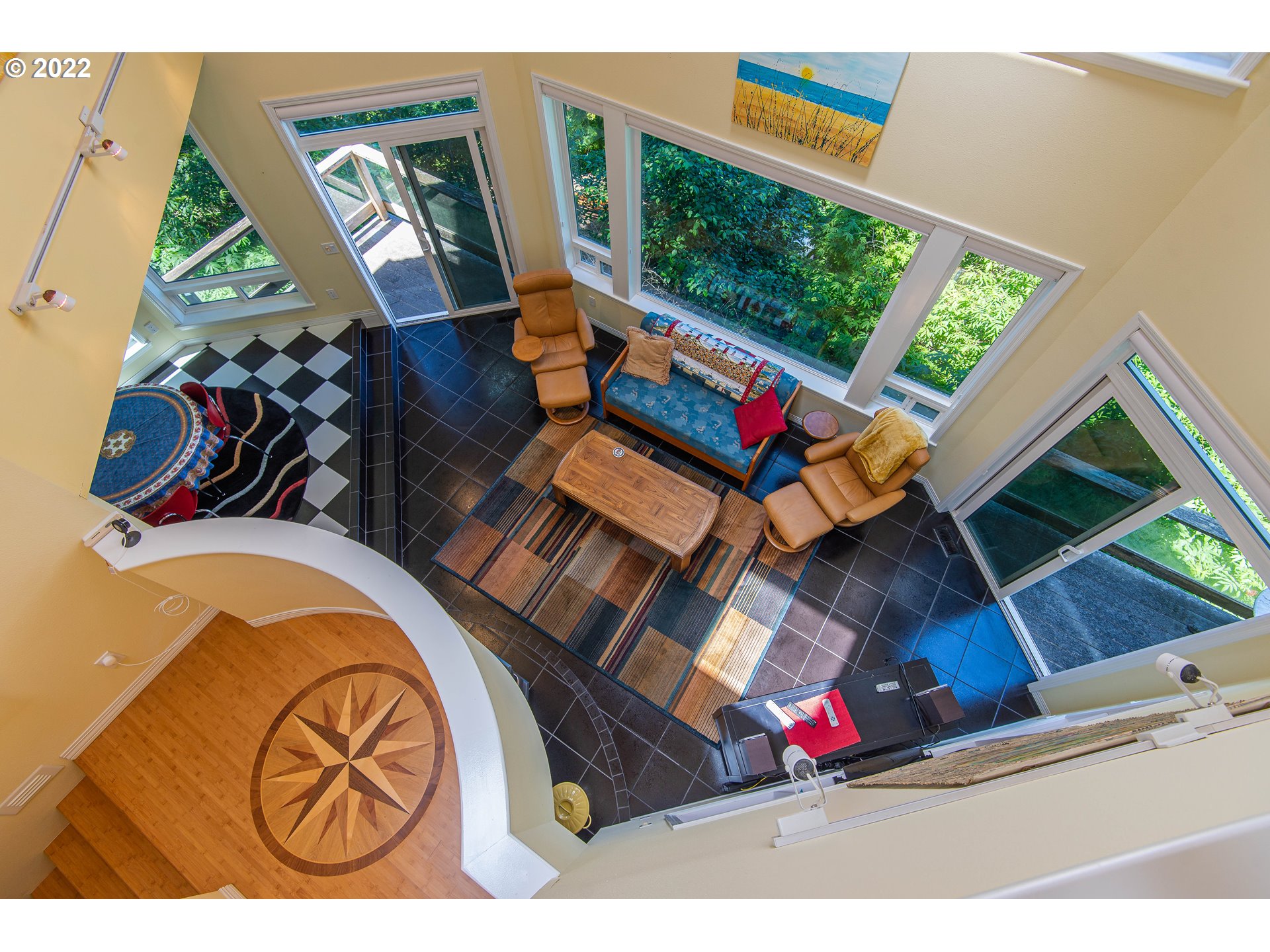 230 Crestview Drive Yachats, OR 97498 - Photo 29 of 31 a living room with furniture and a wooden floor