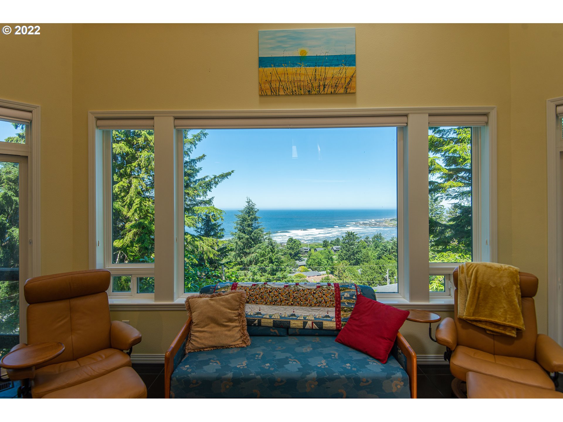 230 Crestview Drive Yachats, OR 97498 - Photo 9 of 31 a outdoor living space with furniture and a window