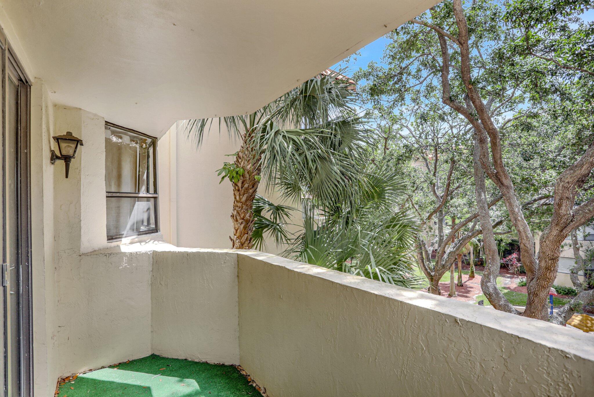 7451 Northwest 16th Street, Unit 303 Plantation, FL 33313 - Photo 27 of 41 a view of a yard from a window