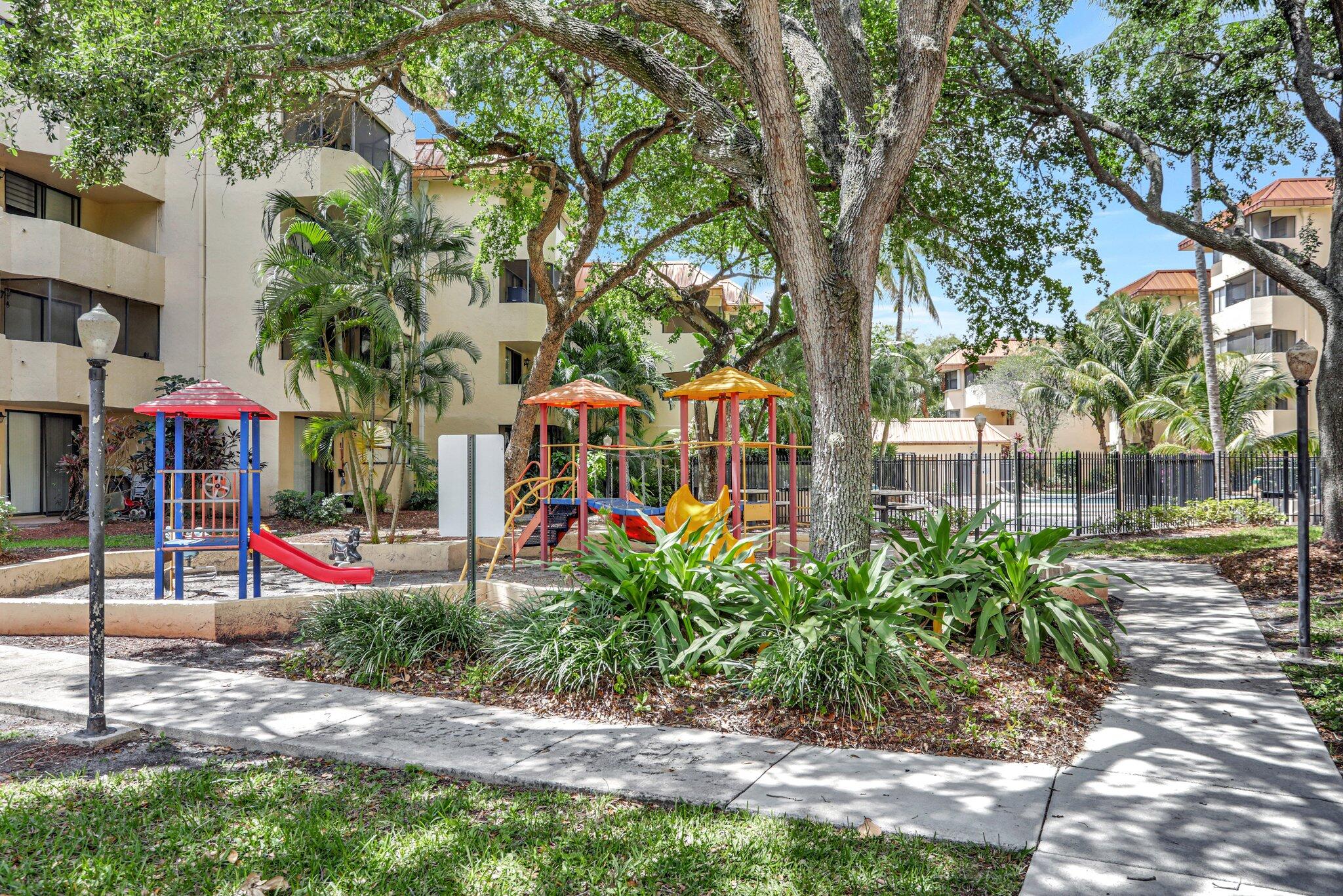 7451 Northwest 16th Street, Unit 303 Plantation, FL 33313 - Photo 30 of 41 a view of street with sitting area