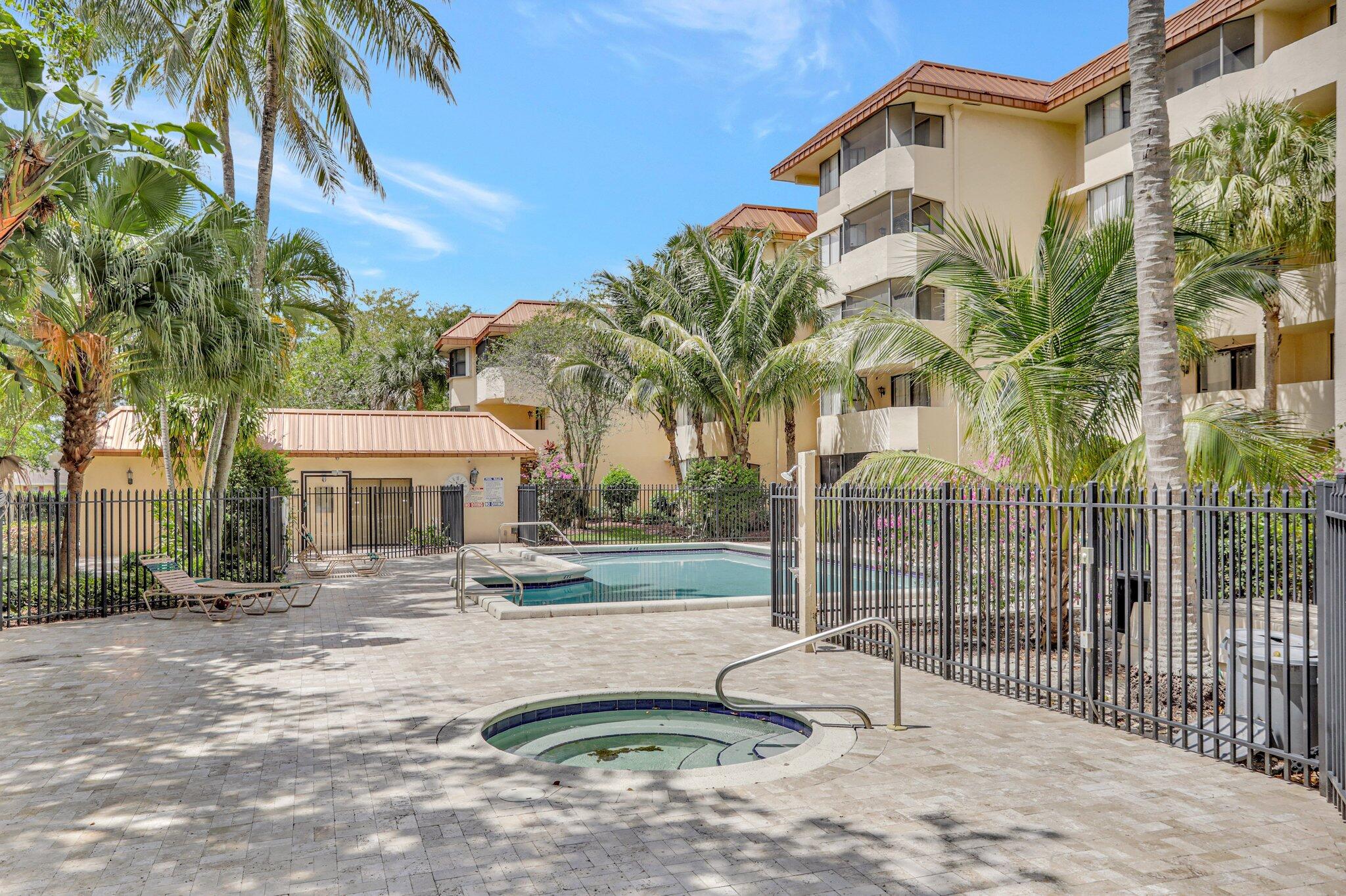 7451 Northwest 16th Street, Unit 303 Plantation, FL 33313 - Photo 31 of 41 a view of a house with a patio