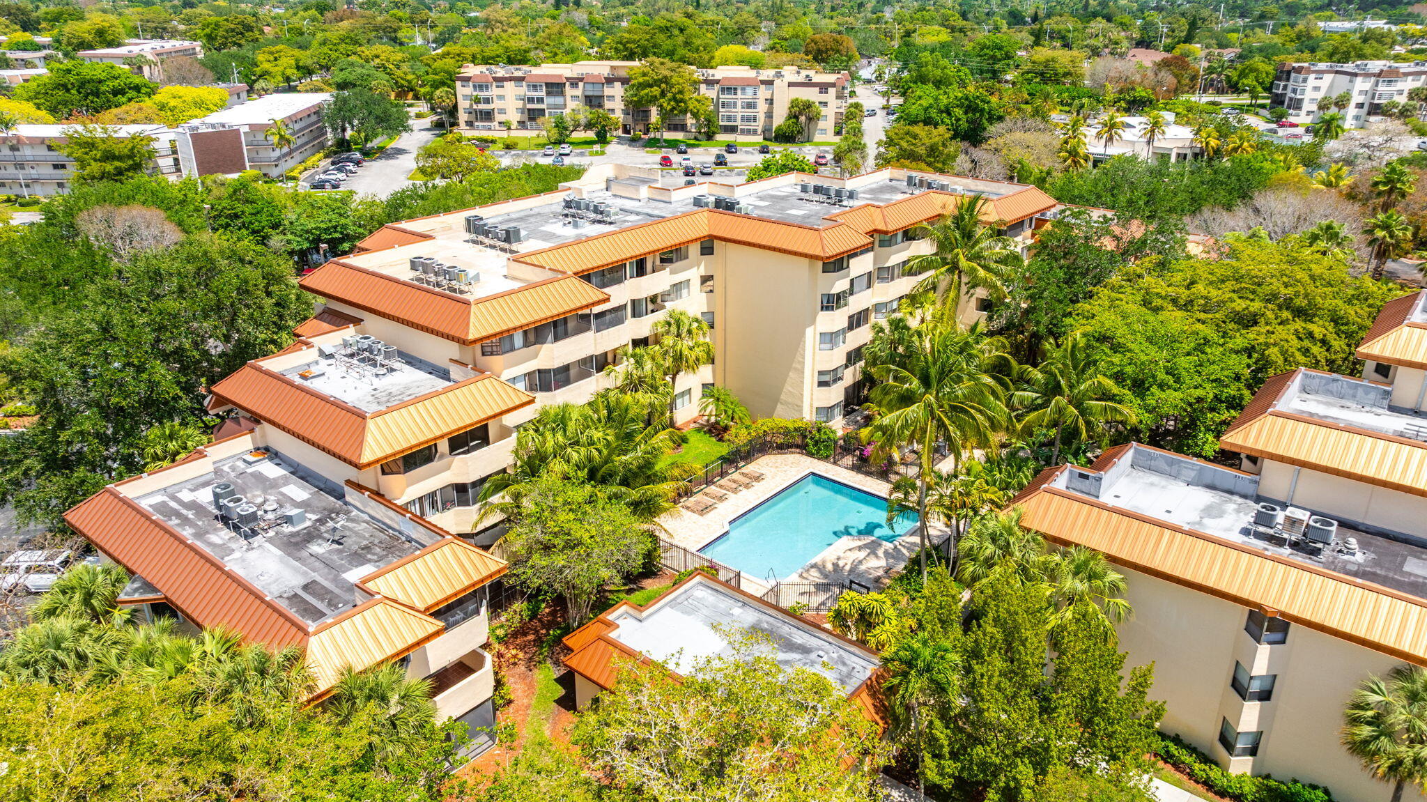 7451 Northwest 16th Street, Unit 303 Plantation, FL 33313 - Photo 33 of 41 an aerial view of a house with swimming pool and ocean view