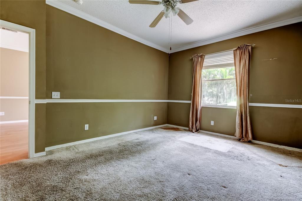 10708 Northridge Court Trinity, FL 34655 - Photo 21 of 59 a view of an empty room with a window