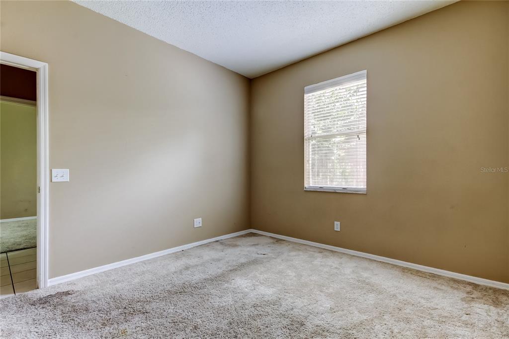 10708 Northridge Court Trinity, FL 34655 - Photo 27 of 59 an empty room with windows