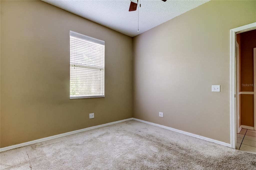 10708 Northridge Court Trinity, FL 34655 - Photo 31 of 59 a view of an empty room with a window