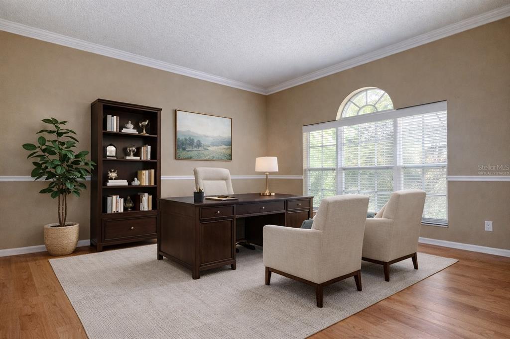 10708 Northridge Court Trinity, FL 34655 - Photo 4 of 58 a living room with furniture potted plant and window