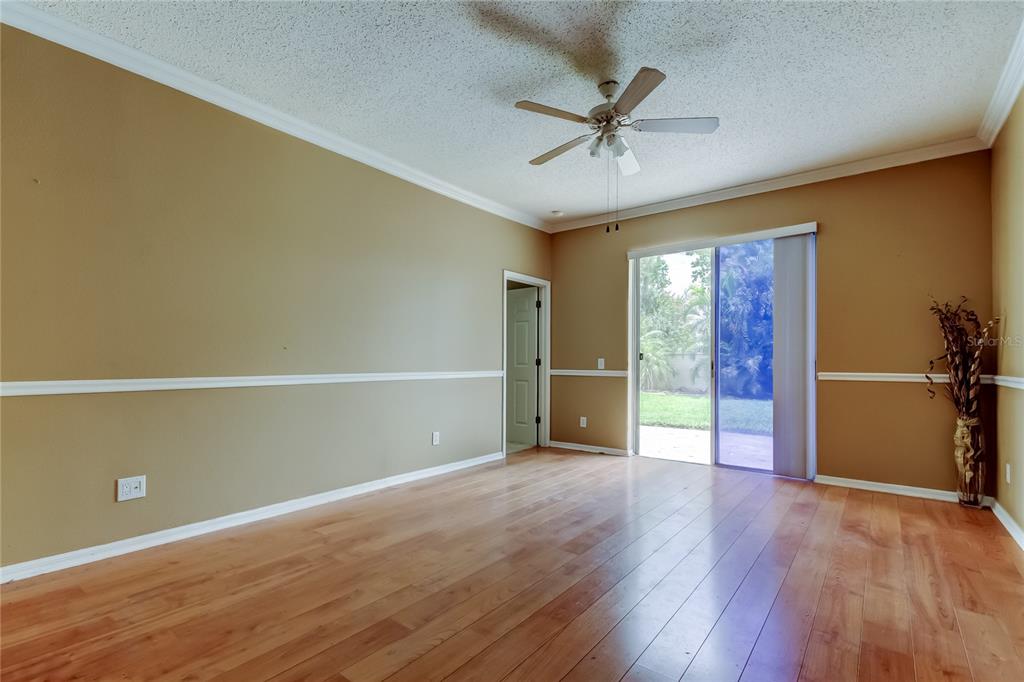 10708 Northridge Court Trinity, FL 34655 - Photo 44 of 58 wooden floor in an empty room with a window